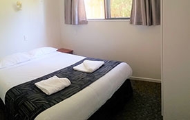 self-contained 2-bedroom cabin bedroom #1